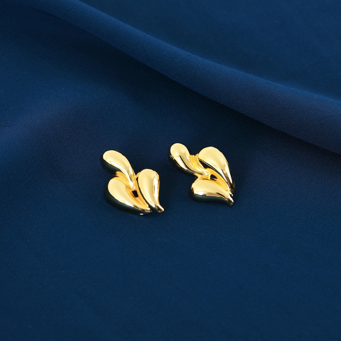 Gold Abstract Art Studs For Women – premium designer gold studs for women with an abstract design