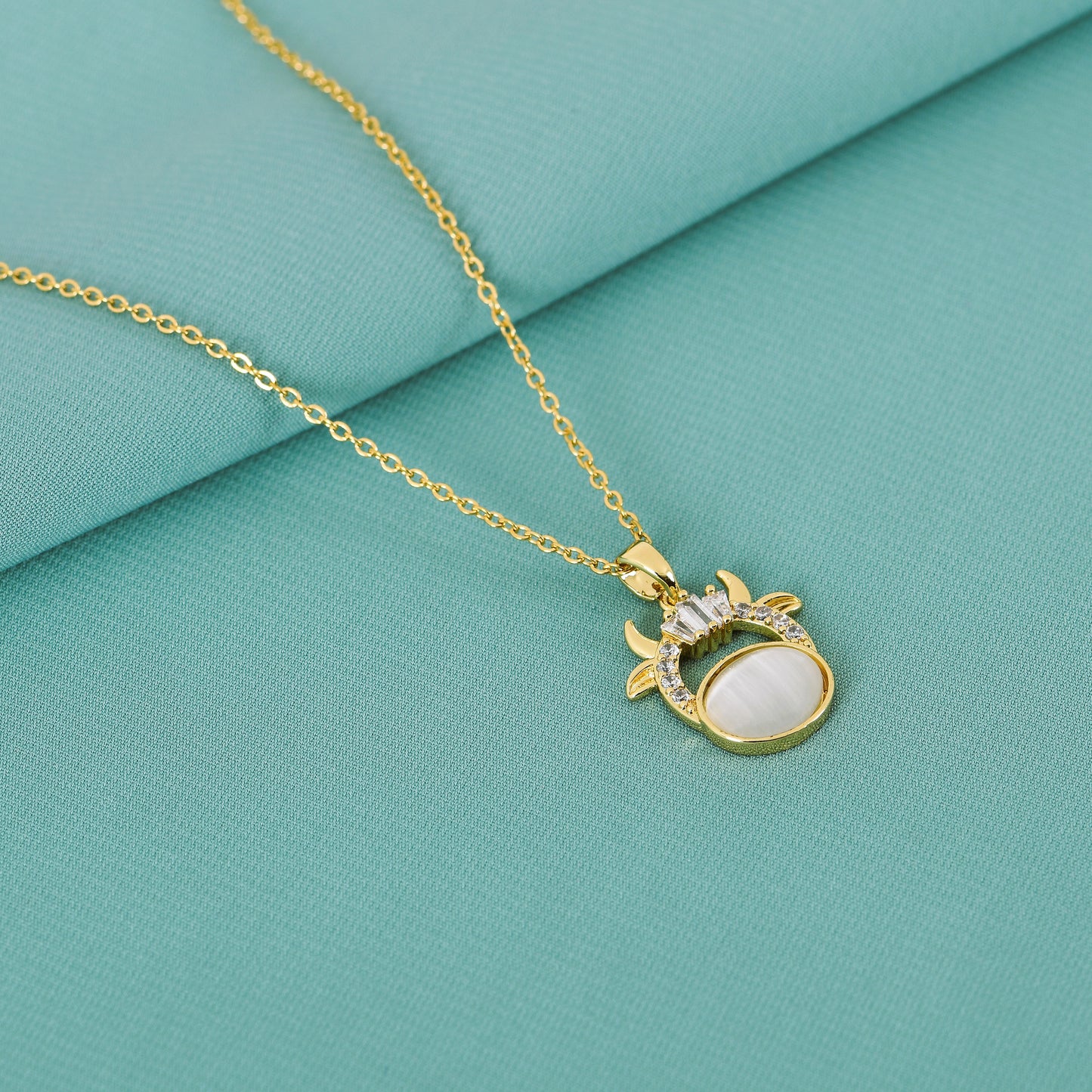 Gold Cow Symbol Pendant Necklace for Women – a stunning gold-toned pendant necklace with cultural charm