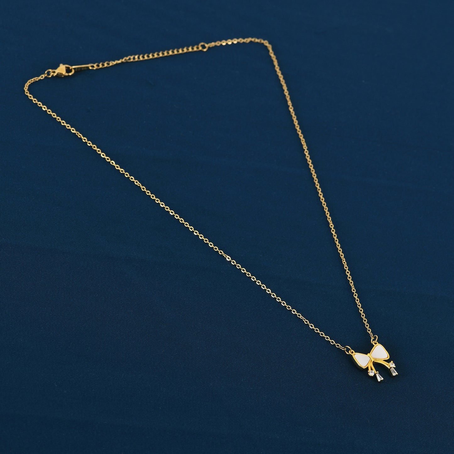 Gold CZ Ribbon Bow Necklace For Women – stylish and affordable among modern necklace designs with price visible online