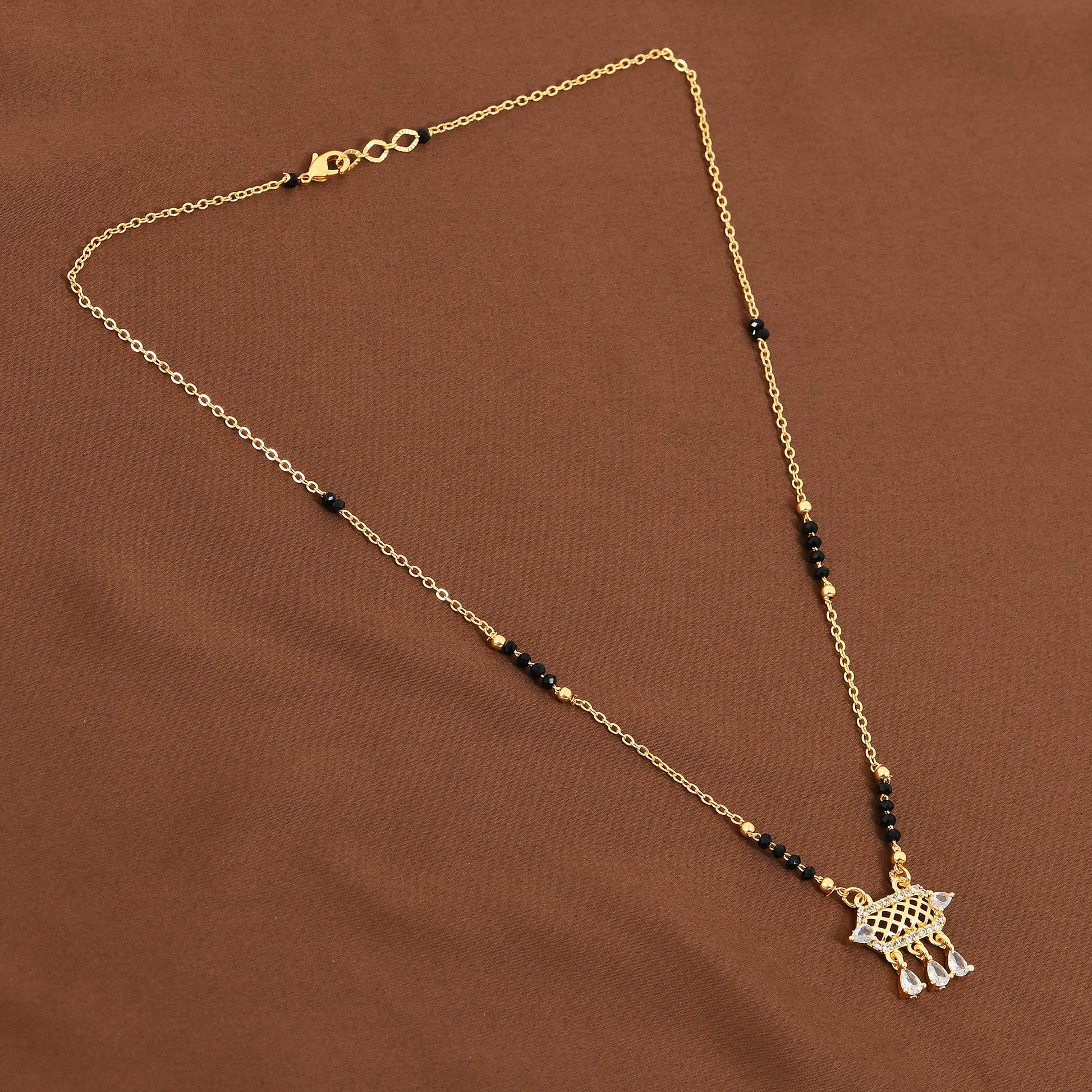 Gold CZ Charm Mangalsutra For Women crafted in simple mangalsutra designs for modern daily wear
