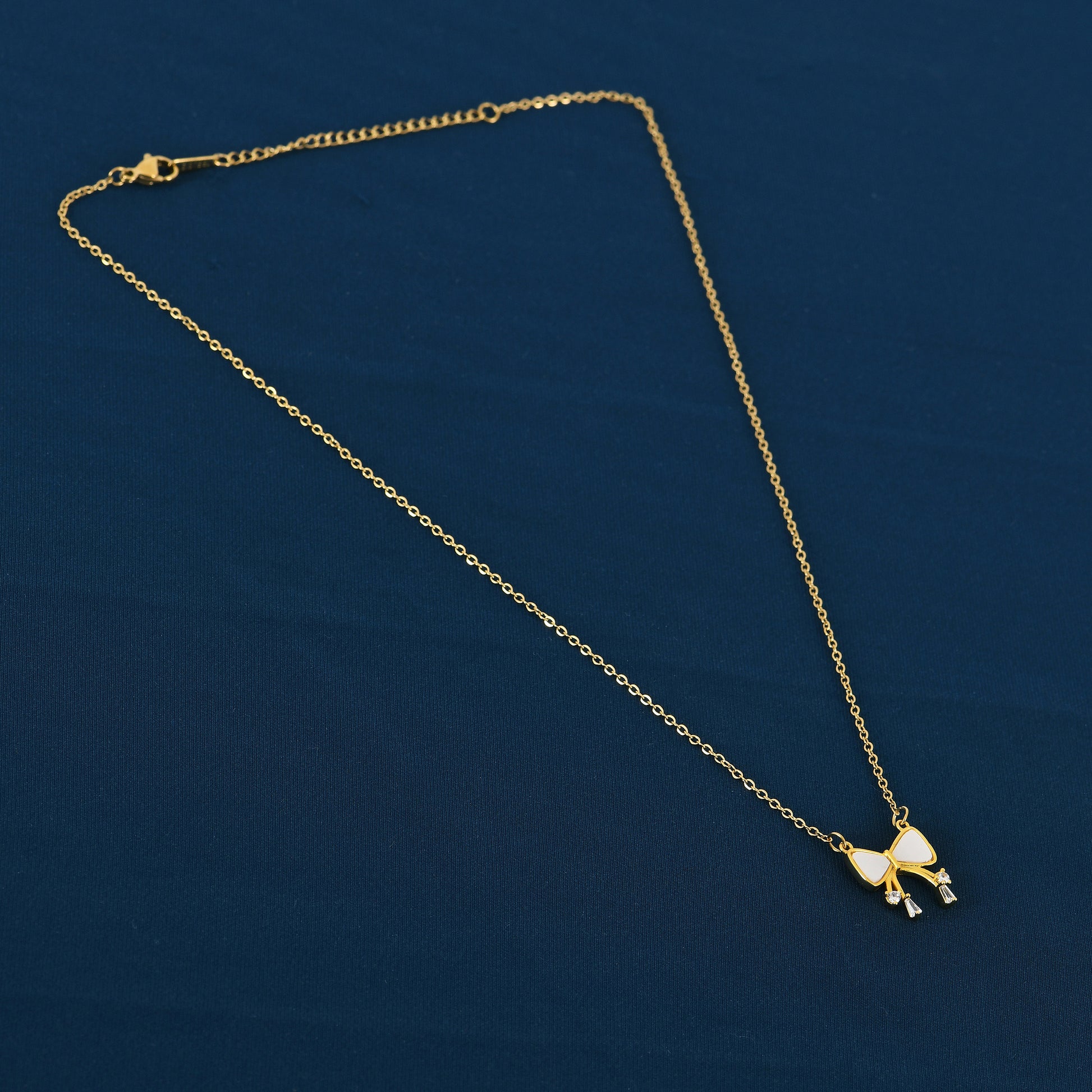 Gold CZ Ribbon Bow Necklace For Women – stylish and affordable among modern necklace designs with price visible online